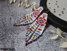 Multicolor Bohemian Flower Earrings, Bohemian Flower Earrings With Dangling Beads, Multicolor Bohemian Dangle Flower Earrings, Bohemian Flower Drop Earrings With Dangling Beads, Bohemian Beaded Dangle Flower Earrings, Bohemian Flower Earrings With Colorful Beads, Bohemian Flower Drop Earrings With Colorful Beads, Bohemian Multicolor Flower Earrings With Colorful Beads, Bohemian White Flower Earrings With Colorful Beads