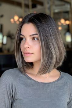 A dramatic bob cut that stands out with its ashy highlights and money pieces, creating a bold and edgy look against the dark base. Tap the link for more style inspiration! Brunette A Line Bob Shoulder Length, Color Hair Ideas For Dark Hair, Short Hair And Color, Color Hair For Short Hair, Short Hair With Gray Highlights, Highlights Color, Short Hair With Color Ideas, Short Hair Highlights Dark Hair, Hair Highlights For Short Hair