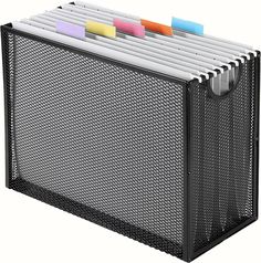 a black mesh file holder with colored sticky notes on the top and bottom compartments for pens