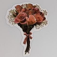 a bouquet of pink roses on top of a sticker that is attached to a wall