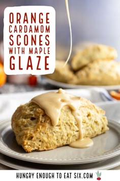 orange scones with maple glaze on a plate