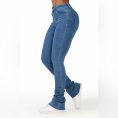 A Contemporary Pair Of Women's Stacked Flare Jeans In Medium Wash. Designed With Premium Stretch Fabric And A Super Stacked Denim Construction For The Perfect Pair Of Going-Out Jeans. Zip Fly With Button Closure 5-Pocket Build High-Waisted Silhouette Fitted Through The Hip Flare Leg Openings Stretch Waistband Frayed Hems Super Stacked Construction 46" Inseam These Run A Bit Small Fitted Mid-rise Jeans With Rhinestones, Denim Blue Straight Leg Bottoms For Night Out, Fitted High Rise Jeans With Rhinestones, Fitted High-rise Jeans With Rhinestones, Fitted High Rise Rhinestone Jeans, Fitted Straight Leg Jeans With Rhinestones, Fitted Denim Flare Jeans With Rhinestones, Fitted Straight Leg Rhinestone Jeans, Non-stretch Denim Blue Bottoms For Night Out