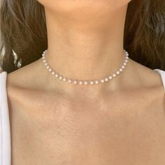 Silver And Pearl Necklace/Choker: A Simple Piece To Stack With Necklace Or Be Worn By Itself. Has Adjustable Clasp To Vary Length From A Choker To Necklace. In The Picture It Is Worn At Its Shortest Length To Be A Choker. A Great Gift Or Everyday Piece. Brand New And Comes With Packaging ! - Same Day Shipping - Can Be Packaged Specially If Gifted (Free) White Pearl Clavicle Choker Necklace, Trendy White Pearl Necklace For Party, White Pearl Choker With Clavicle Chain, White Pearl Chain Choker Necklace, Trendy White Pearl Choker Necklace, White Classic Choker For Party, Classic White Choker For Party, White Pearl Necklace With Clavicle Chain, Trendy White Pearl Clavicle Chain Necklace