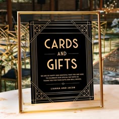 Direct your guests with sophistication using this Cards and Gifts Black Gold Art Deco Wedding Sign, designed with timeless black and gold tones and a striking geometric pattern. This elegant and classic sign will perfectly complement your art deco wedding décor. If you need any assistance personalizing it, please contact me! Black Elegant Wedding Decor, Art Deco Wedding Reception Decor, Black Wedding Accents, Art Deco Wedding Sign, Black And Gold Wedding Decorations, Art Deco Wedding Decorations, Black And Gold Wedding Sign, Art Deco Wedding Table Names, Art Deco Wedding Ideas