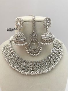 Silver color Polki Necklace Set comes with Jhumki earrings and tikka / Indian Jewelry/ High Quality Kundan and Polki Jewelry/ Bollywood Jewelry/Wedding Jewelry All items are shipped from Brampton, Ontario, Canada. If you need your item by a certain day, please reach out to us for express delivery option before placing the order so that we can update the shipping for you. Standard shipping/delivery timeline Below are the delivery timeline estimates once the order ia shipped ---> USA delivery timeline * 4-8 business days to major urban centers in USA. It may take 2-3 days extra to remote locations ---> Canada delivery timeline  * 2-3 business days - GTA  & Montreal  * 2-4  business days - Rest of Ontario/Quebec * 4-8 business days-  Rest of Canada    ---> Europe/Middle East timeline * 5-10 b Tikka Indian Jewelry, Polki Necklace Set, Brampton Ontario, Necklace Set Indian, Polki Necklace, Jhumki Earrings, Bollywood Jewelry, Polki Jewellery, Buy Handmade