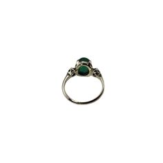 Vintage 14 Karat White Gold Emerald and Diamond Ring Size 4.5   This elegant ring features on oval cabochon emerald (8.8 mm x 7.2 mm) and two round brilliant cut diamonds set in classic 14K white gold.  Shank: 1.4 mm.  Emerald weight: 1.71 ct.  Total diamond weight: .12 ct.  Diamond clarity: VS1-VS2  Diamond color: G-H  Ring Size: 4.5  Stamped: 14K  Weight: 2.2 gr./ 1.4 dwt.  JAGi Certificate included.  Very good condition, professionally polished.  Will come packaged in a gift box or pouch (whe Classic Green Signet Ring With Center Stone, Classic Oval Bezel Set Opal Ring, Luxury White Gold Oval Cabochon Emerald Ring, Classic Oval Opal Ring With Bezel Setting, Timeless Oval Emerald Ring With Bezel Setting, Formal Opal Ring With Bezel Setting, Elegant Green Emerald Ring With Round Stone, Formal Polished May Birthstone Signet Ring, Formal May Birthstone Signet Ring With Polished Finish