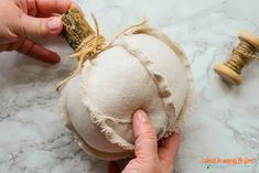 someone is peeling the fabric off of an old pumpkin