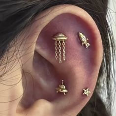 three different types of ear piercings