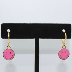 handmade, high quality smiley face huggie earrings! won't tarnish or fade! hypoallergenic  please feel free to message me! Pink Nickel-free Huggie Jewelry, Pink Nickel-free Huggie Hoop Earrings, Cute Small Hoop Pink Earrings, Pink Huggie Hoop Earrings Nickel Free, Pink Drop Huggie Earrings, Nickel-free Pink Huggie Hoop Earrings, Cute Small Pink Hoop Earrings, Cute Adjustable Huggie Earrings, Playful Pink Round Earrings