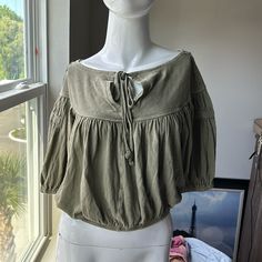 Nwot We The Free Green Shirt Top Blouse, Size X-Small, Machine Washable, 100% Cotton, Tie String At Upper Front Bohemian Cotton Tops For A Day Out, Relaxed Fit Cotton Peasant Top For Day Out, Casual Cotton Peasant Top For Spring, Casual Cotton Peasant Top For Fall, Casual Short Sleeve Peasant Top For Day Out, Fall Cotton Short Sleeve Peasant Top, Green Cotton Peasant Top For Fall, Fall Cotton Peasant Top With Short Sleeves, Fall Short Sleeve Cotton Peasant Top