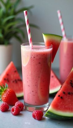 watermelon, raspberry and strawberry smoothie with strawberries on the side