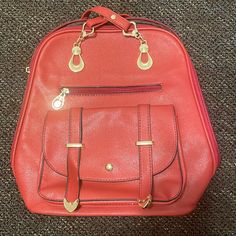 Red Leather Bag. Has Straps For The Back So You Can Wear As A Book Bag. Has 8 Compartments To Place Things. Fairly New. Never Been Worn. Would Love To Find A Nice Home For It Large Capacity Red Satchel For School, Large Capacity Red School Bag, Trendy Red Shoulder Bag For School, Red Satchel With Zipper Closure For School, Trendy Red Satchel With Zipper Closure, Red Tote Bag For School, Trendy Red Pouch Bag, Trendy Red Pouch Satchel, Red School Bag With Removable Pouch