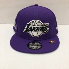 the los angeles lakers purple and white team logo hat is shown on a white surface