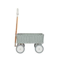 a white wicker wagon with wheels and a wooden stick in the basket, on a white background