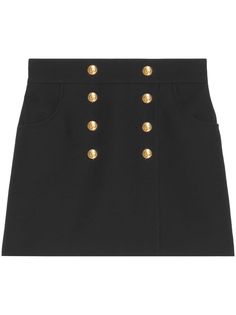 button-up crepe skirt from Gucci featuring black, wool-silk blend, crepe texture, gold-tone buttons, concealed rear zip fastening, two rounded pockets to the sides and thigh-length. This item is in size 40 and the color is Black Luxury Chic Mini Skirt With Buttons, Luxury Lined Casual Mini Skirt, Luxury Cotton Mini Skirt For Work, Luxury Women's Mini Skirt With Pockets, Luxury Gucci Formal Skirt, Luxury Mini Skirt With Button Closure, Luxury Mini Skirt With Pockets For Women, Luxury High Waist Lined Mini Skirt, Luxury Elegant Mini Skirt With Buttons