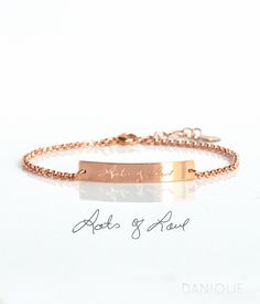 "Let us create for you a truly personalized and meaningful piece of jewelry. With a photograph of any handwriting, we can design and engrave on either 14k gold filled, 14k rose gold filled, or bright sterling silver bar that is then secured to a sturdy chain bracelet. The bar is gently bent to conform to the shape of a wrist and the backside can be engraved as well. This is a touching way to keep those you love close to you always. Bar measures 30mm x 5mm. Default length is adjustable from 6.75- Personalized Rose Gold Jewelry With Engraving Option, Minimalist Name Bracelet With Engraving For Anniversary, Personalized Engraved Bracelet Jewelry Gift, Personalized Engraved Bracelet Jewelry, Personalized Engraving Bracelet Jewelry Gift, Minimalist Jewelry With Engraving Option For Mother's Day, Personalized Engraving Bracelet Jewelry, Minimalist Bracelet For Mother's Day Gift, Rose Gold Jewelry With Engraving Option For Mom