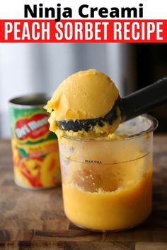 an ice cream scooping out of a jar filled with peach sorbet recipe