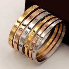 18k Gold Plated over Stainless Steel Great addition to your jewelry collection. Lovers Bracelet, Bangles Gold, Trending Bracelets, Cubic Zirconia Bracelet, Real Gold Jewelry, Bracelet Love, Crystal Bangle, Stainless Steel Bangles, Buckle Bracelet