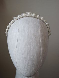 Hand-set Austrian crystals & creamy faux pearls create this utterly chic headband! | wedding inspo, wedding, wedding hair, bridal hair styles, bridal hair accessories, bridal headpieces, headpieces for brides, bridal tiara, bridal crown, tiaras and crowns, headpieces for brides, luxury jewelry, diamond crown, bridal hair ideas, sparkly tiaras, sparkly wedding tiara, pearl tiara, pearl accessories, pearl hair accessories, pearl jewelry, chic wedding, bridal gift ideas #bridetobe #wedding Alice Clothes, Pearl Headband Wedding, Royal Ball, Chic Headband, Pearl Headpiece, Pearl Tiara, Beautiful Tiaras, Royal Tiaras, Headpiece Jewelry