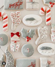 christmas cookies decorated with red and white icing, candy canes, candies, holly wreaths, peppermink tree, mist cones, snowflakes and more