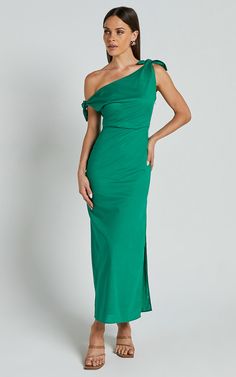 Show off your effortlessly chic style in the Cincinnati Midi Dress. This stunning off-the-shoulder dress features a side split and is made from a comfortable linen fabric, perfect for those warm summer days. The green color adds a pop of freshness to any outfit, while the fit and flare silhouette flatters all body types. Whether you're heading to brunch or enjoying a day out with friends, this sleeveless midi dress is the perfect choice for an easy and stylish look. Embrace your individuality an Red Sequin Dress, Basic Black Dress, Neon Outfits, Bachelorette Dress, Feel Empowered, Spring Maxi Dress, Fit And Flare Silhouette, Column Dress, Long Sleeve Knit Dress