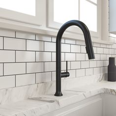 Kitchen faucet with extra slim design, pull-down spray head and standard and needle spray options. 360 degree swivel spout. In matte black finish with brass body. BOCCHI Tronto Matte Black Double Handle Deck-mount Handle Residential Pull-down Kitchen Faucet with Sprayer | 2026 0001 MB Black Sink Faucet Kitchen Island, Black Kitchen Faucet Blue Cabinets, Matte Black Kitchen Faucet White Cabinets, Matt Black Kitchen, Traditional Kitchen Faucets, Black Modern Kitchen, Modern Kitchen Faucet, Matte Black Kitchen, Fireclay Farmhouse Sink