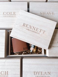 the personalized wooden box is filled with grooms's products and his name on it