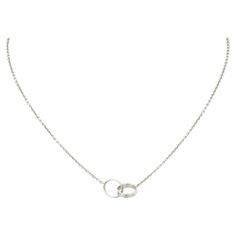 Cartier Baby Love Necklace In 18K White Gold. This Necklace Has 2 interlocking Love Rings On A 16" Chain. SN. FO3604 Cartier Love Necklace White Gold, Silver Cartier Necklace, White Gold Jewelry Aesthetic, White Gold Jewelry Necklaces, Cartier Love Necklace, Accessories Png, Sliver Necklace, Love Rings, Necklace White Gold