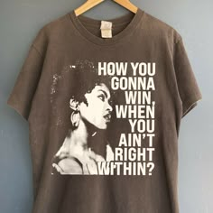 How you gonna win when you ain't right within, Lauryn music Hill, Lauryn T-shirt , Lauryn concert , Lauryn  fans Gift for men women t-shirt ABOUT MATERIAL: Comfort Colors® 1717 Made with medium fabric (6.1 oz/yd² (206.8 g/m consiting of high quality, 100% ring-spun US cotton for long-lasting comfort. The relaxed fit keeps the wearer comfy in both casual and semi-formal settings while the crew neckline delivers that classic, neat style which makes it perfect for accessorizing. What's more, the pr Sayings On Shirts For Women, 90s Fashion Outfits Hip Hop Party Women, Lauryn Hill Shirt, Men’s Shirt, 90 Fashion Outfits, Lauryn Hill Style, Outside Concert Outfit, T Shirt Outfits Women, Cut A Shirt