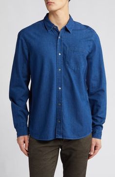 Lightly faded Japanese chambray made of cotton and linen keeps the vibe casual and relaxed in a shirt that always looks great when you leave it untucked. 28" length (size medium) Front button closure Spread collar Long sleeves with button cuffs Chest patch pocket 83% cotton, 17% linen Machine wash, dry flat Imported