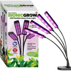 four grow lights in front of a box