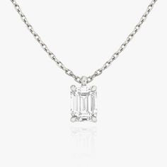 Our solitaire Pendant is a timeless staple featuring a lab grown diamond, set on a 14k solid gold chain. Explore VRAI necklaces. Diamond Pendant Necklace Emerald Cut, Emerald Necklaces, Rings Everyday, Solitaire Diamond Pendant, Necklace Emerald, Jewelry To Buy, Jewellery Showroom, Bling Ring, Modern Engagement Rings