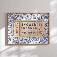 a blue and white floral print with the words shower karaoke one entry on it