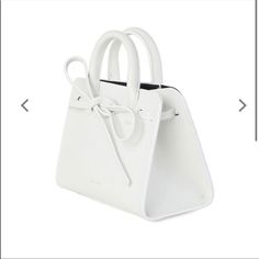 New In Pink Box And With Dust Bag Mansur Gavriel Mini Mini Sun Bag In White. Yes These Are Brand New So You Can Gift It To Your Friend, Wife, Gf, Sister, Mom, Etc. Please Message Me If You Have Any Questions. Also Selling A Pink One In Separate Listing. Both Colors Are Brand New. Sold Out, They Are Not Making The Sun Bag Line Anymore. Modern White Box Bag For Gift, White Top Handle Satchel As Gift, White Top Handle Satchel For Gift, Luxury White Leather Box Bag, White Double Handle Box Bag For Gift, White Double Handle Box Bag Gift, Luxury White Pouch Box Bag, Luxury White Box Bag With Removable Pouch, Luxury White Box Bag With Top Carry Handle