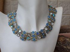 Wedding blue necklace. Bridal rhinestone  necklace. Light blue necklace. Bridesmaid jewelry gift . Flower Diamond clear necklace.It would be a great wedding accessory for bride, mother of bride, mother of groom and bridesmaids.Details:It is made of silver enamel paint and  crystals The necklace is 40 cm long (about 15.7 inches) and has an extension chain to fit all sizes.Width of necklace is 2 cm/1.8 inchThe necklace will be packed in a gift box.FOR MY SHOP COLLECTION HERE:https://www.etsy.com/i Blue Sparkling Stones Necklace For Wedding, Blue Sparkling Stone Necklaces For Wedding, Blue Necklaces With Sparkling Stones For Wedding, Blue Crystal Necklace For Wedding, Blue Bling Jewelry For Wedding, Blue Bling Wedding Jewelry, Blue Crystal Necklaces For Wedding, Blue Costume Jewelry Necklaces For Wedding, Blue Crystal Rhinestone Necklace For Wedding