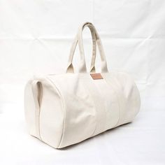 ♡ This Gym Bag is made from 14 oz canvas. ♡SIZE: 22 wide x 12 tall Cotton Webbing Handles 2 Front Handle 2 Side Handle 1 inside zippered pocket Heavy duty zipper with 2 pull Stitched with Nylon Thread for long lasting use 👉 This Gym Bag is washable, and can be wash in a washing machine. This Bag can be use as: Travel Bag Weekender Bag Gym Bag Yoga Bag ♡ PROCESSING TIME: Your Gym Bag will ship within 1-3 business day after purchase. ♡ SHIPPING TIME: 2-5 business days within the US via USPS mail. Photographers Bag, Bag Workout, Workout Bag, Compact Bag, Sports Bags Gym, Sac Week End, Workout Bags, Yoga Bag, Round Bag