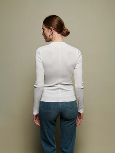 The perfect white, mock neck in our responsible Organic Rib. Use it as a layering piece or wear on it's own. Classic Stretch Tops With Ribbed Cuffs, Classic Long Sleeve Stretch Top, Classic Stretch Long Sleeve Tops, Modern Slim Fit White Tops, Modern Slim Fit White Top, Modern White Slim Fit Tops, Modern Long Sleeve Tops For Layering, Classic Long Sleeve Tops With Minimal Stretch, White High Stretch Long Sleeve Top