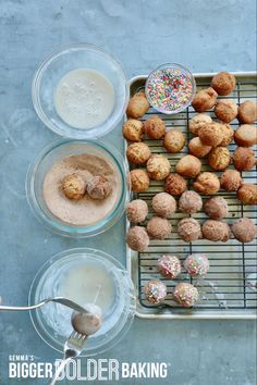 an overhead view of doughnuts, milk and sprinkles on a cooling rack