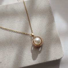 The Mae Pearl Necklace is a glamorous statement piece. Embellished with a pearl pendant, this necklace is perfect for any formal or elegant occasion. -stainless steel, gold plated-15" with 2" extender Engagement Hairstyles, Pendant Set, Pearl Pendant, Statement Pieces, Pearl Necklace, Gold Plate, Hairstyles, Stainless Steel, Pendant