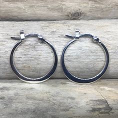 "The perfect everyday accessory, these glistening hoop earrings are made from 925 Sterling Silver. if you want something not too small or not too big, this is perfect for you! These hoops are 0.78\" (20mm) in length and width. SOLD AS A PAIR For more Silver Earrings: http://etsy.me/2AJWHDP ENTER MY SHOP HERE: KalismaBijoux.etsy.com HANDMADE by ME - All my work is crafted with the utmost care in my studios - in Madrid, SPAIN CHANGES Don't hesitate to contact me if you have an idea or request. ABO Classic Round Hypoallergenic Hoop Earrings, Classic Hypoallergenic Round Hoop Earrings, Classic Hypoallergenic Hoop Earrings, Adjustable Classic Hoop Earrings, Hypoallergenic Round Hoop Earrings For Everyday, Everyday Hypoallergenic Round Hoop Earrings, Modern Round Huggie Earrings With Ear Wire, Classic Adjustable Hoop Earrings For Everyday, Classic Circle Hypoallergenic Earrings