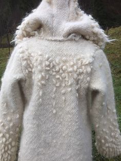 "White woven wool coat. Whimsy, with rich and original woolen fur details, this coat will make you feel like a fairy queen. Stylish and original accessory for all season wardrobe! Eco friendly fashion product. If you are looking for special clothes for yours special loved one... Why this coat is special. --Made 100% according ancient technology and traditions, from the beginning (sheep shearing). With an ethnic design developed by me. --Made using help of happy sheeps (no sheeps were harmed in t Felted Clothing, Sheep Shearing, Ancient Technology, Wool Coat Women, Fairy Queen, Special Clothes, Ethnic Design, Coat Winter, White Coat