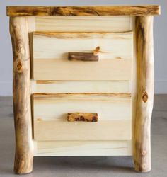 a wooden dresser with three drawers and one drawer on the bottom, made out of wood