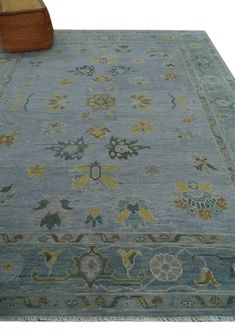 a blue rug with an intricate design on it