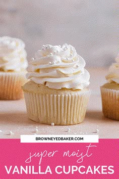 vanilla cupcakes with white frosting and sprinkles on the top