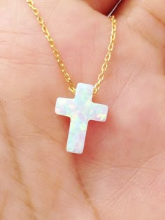 Synthetic White Opal Cross pendant, comes with a 925 Sterling Silver necklace, Yellow gold plated, Rose gold plated. Notice that this necklace comes with extender to adjust to different lengths. Chain total length : 39.5 cm / 15.5 inches not included extender. Extender length : 2.5 cm / 1 inche approximately Cross size: 12mm x 9mm Spring clasp Our jewelry is packaged in a beautiful gift box. If you need a necklace as a gift, we can ship to third party. During check out, please leave a note in th What I Want For Christmas, Preppy Jewelry, Necklace Cross, 2024 Christmas, Jewelry Essentials, Funky Jewelry, Necklace White, Cross Pendant Necklace, White Opal