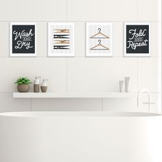 three black and white posters on the wall above a bathtub