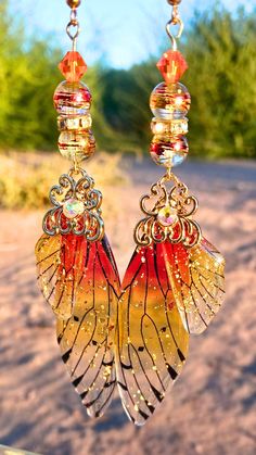 🦋 Illuminate Your Beauty with Monarch Magic 🦋 Behold the captivating allure of our Golden Garden Butterfly Earrings, a sparkling masterpiece inspired by the enchanting Monarch butterfly's resplendent wings. Crafted in limited batches, these earrings are a testament to the artistry of handmade jewelry. ✨ Golden Wings of Splendor: These earrings radiate with the timeless beauty of the Monarch butterfly, casting a golden glow that captures the essence of nature's finest. They aren't just earrings; they're a dazzling celebration of the butterfly's grace. 🌿 Small-Batch Handmade: Crafted with love and devotion in small batches, our Golden Garden Butterfly Earrings are a testament to the art of meticulous craftsmanship. Each pair is a labor of passion, ensuring they hold the essence of our bou Golden Garden, Garden Butterfly, Golden Wings, Butterfly Wing Earrings, Yellow Butterfly, Golden Glow, Butterfly Jewelry, Wing Earrings, Monarch Butterfly