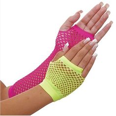 a woman's arm and hand with neon colored mesh on the wrist, holding her hands out