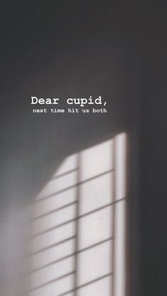 a window with the words dear cupid next to it