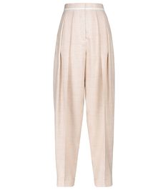 The beige Ariana pants from Stella McCartney are a versatile pair that you can wear from desk to dinner with ease. In line with the label's sustainable ethos, the high-rise design is made from ethically sourced viscose and linen, and have a wide leg with textural pleating. Partner with a white shirt and sandals to complete the look. | Stella McCartney Ariana pleated wide-leg pants Pleated Wide Leg Pants, Outfitters Clothes, Stella Mc, Urban Outfitters Clothes, Daily Look, Bottoms Pants, White Shirt, Stella Mccartney, Leg Pants